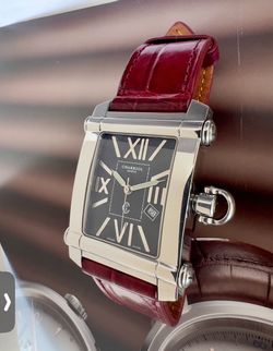 Charriol Colvmbvs (Columbus) reference CCSTRX9 is a luxury Swiss wristwatch featuring a rectangular stainless steel case, reliable quartz movement, an
