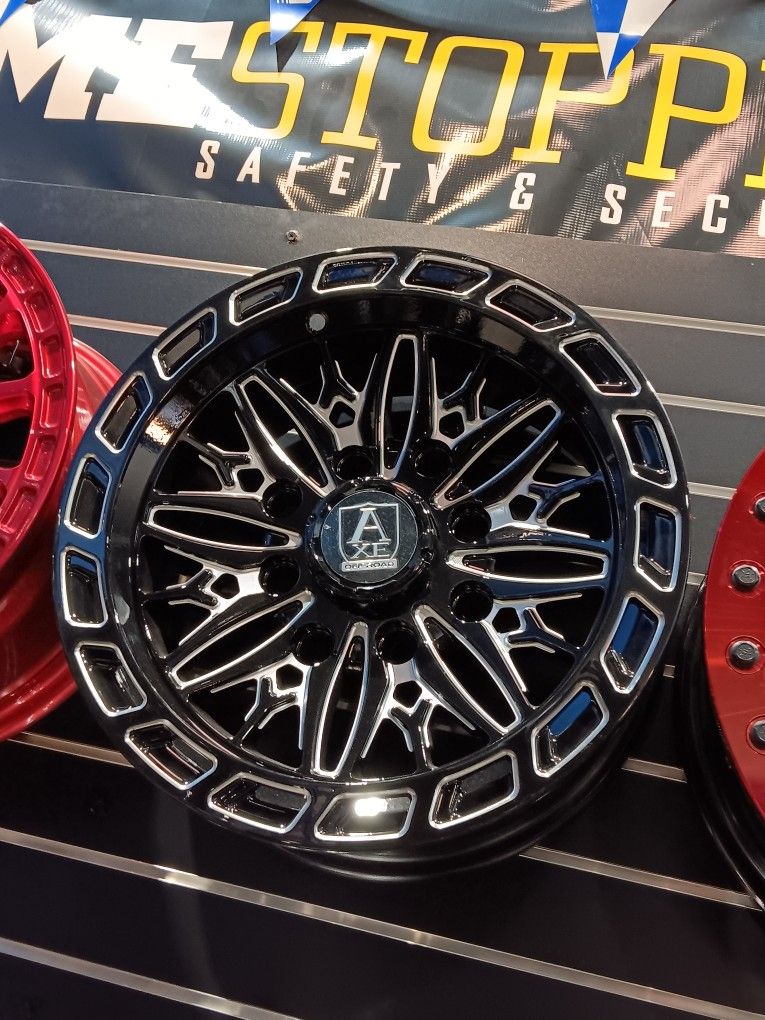 Axe. 15x7 4x156 4x137 Rims & 32x1015 Tires ( CanAm RZR HONDA Utv Sxs