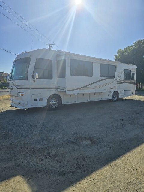 2004 ALFA SEE YA GOLD COACH
