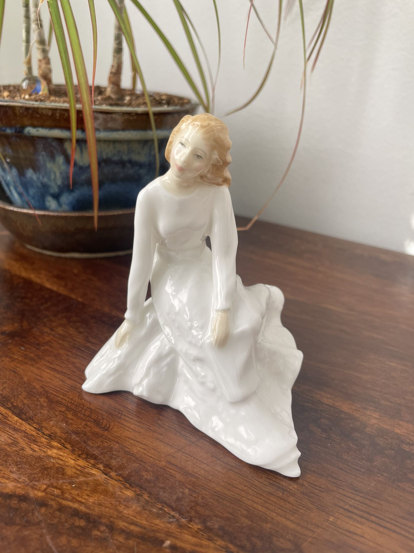 Royal Doulton Porcelain Figurine “Across The Miles”