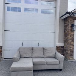2 Piece Grey Sectional With Reversible Chase