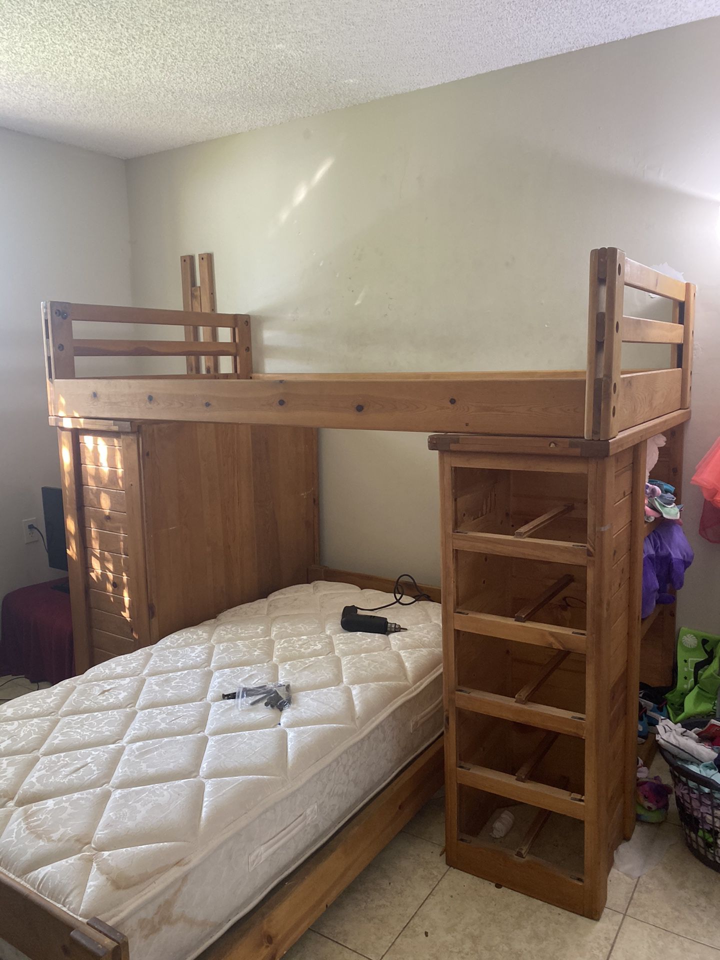 Bunk bed with drawers,desk & shelves on the side . Good condition
