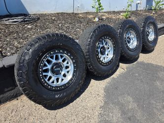 17" KMC w/ 33" BfGoodrich used tires