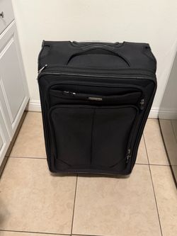 Big luggage size 25 long and 28 wide , first person that brings $15 take it Costa Mesa