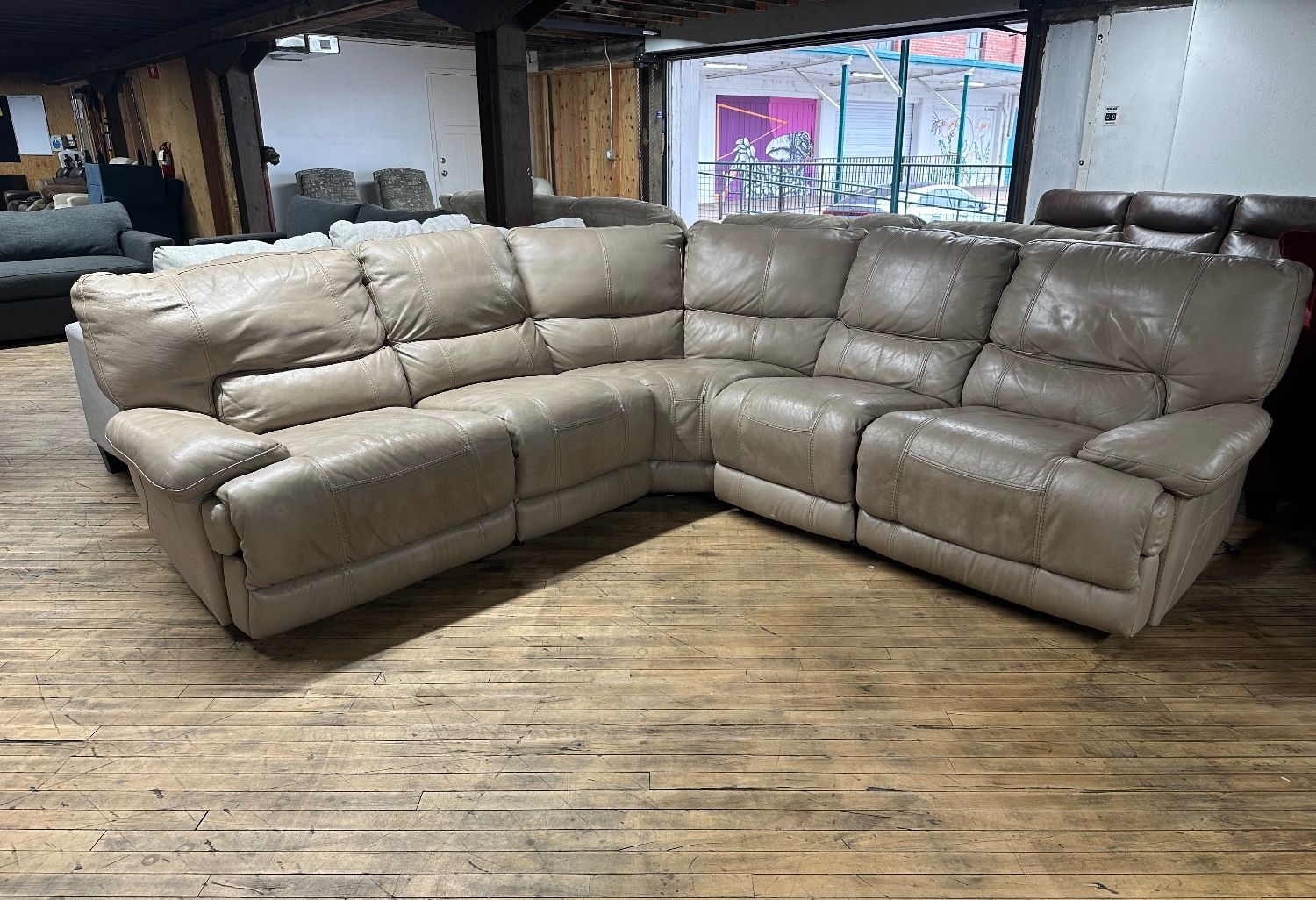 Delivery available leather reclining sectional couch