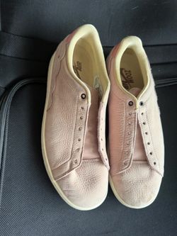 Pink suede Air Jordan sneakers