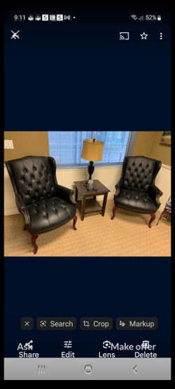 Black wingback chairs