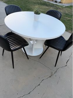 White Dining Table and 4 black faux leather chairs