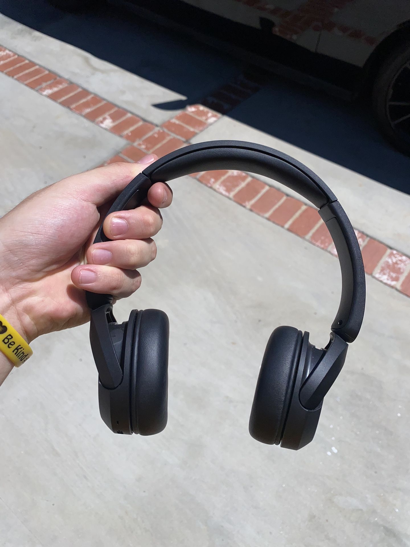 Black Sony wireless bluetooth headphones. 
