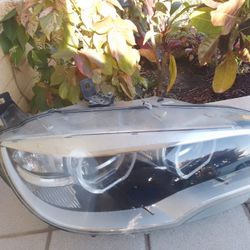 2009 to 2013 BMW X6 Passenger Side Headlight With Original bulb 