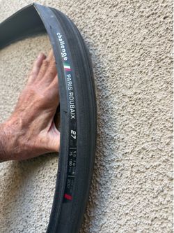 Free road bike wheel, two tires, one tube.