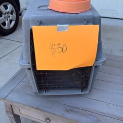 Animal crate and Outward Hound Fun bowl