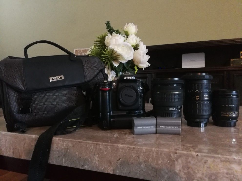 Nikon D80 with 3 lenses, bag, and extended battery pack