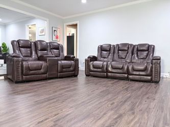 Eric Chuch  Leather Power Reclining Set.