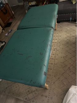 Massage table