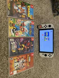 Nintendo Switch OLED With 5 Games