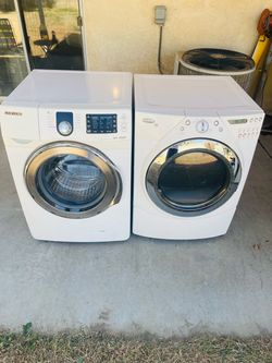 Front load washer and gas dryer