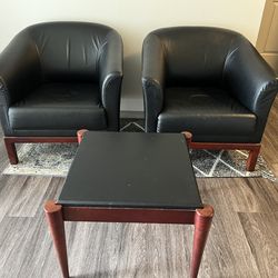 2 faux Leather Chairs And Coffee Table