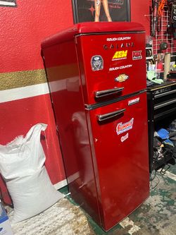 7.6 cu.ft. retro mini refrigerator with dual doors in red.