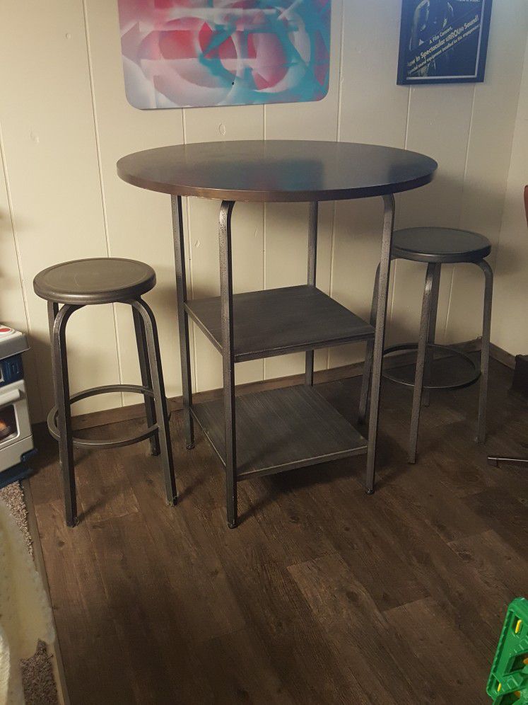 bar top table and stools
