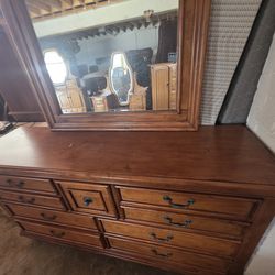 Solid wood Dresser and mirror. 
Delivery Available