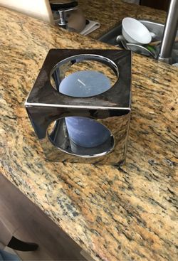 Candle holder with candle