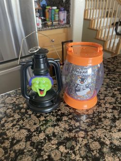 Halloween laughing witch lantern and light