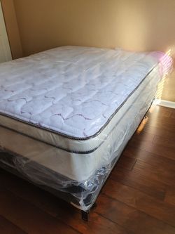 New queen mattress and box spring 2 pc bed frame is not included