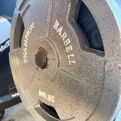 Pair of 100 pounds Olympic weights for 2” bars  pick up in sun valley cash only