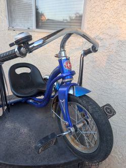 Schwinn Kids Tricycle Blue, vintage. Good tires .
