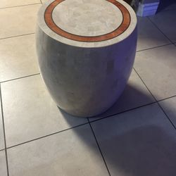 vintage Maitland-Smith drum accent table in tessellated fossil stone with a brass and wood inlay border
