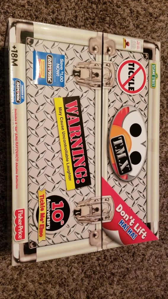 Original tickle me elmo 10th ann. T.m.x