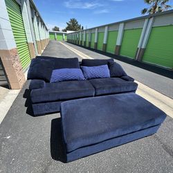 Dark blue sofa and ottoman