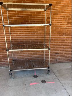 Stainless shelf on castors