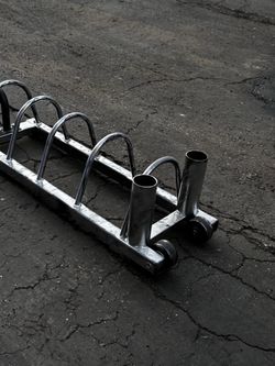 Bar and weight plate holder on wheels