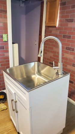 Sink faucet cabinet
