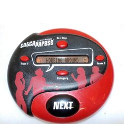 Electronic Catch Phrase Game By Hasbro Gaming. 
Fast-Paced, "Grab It, Guess It, Pass It"