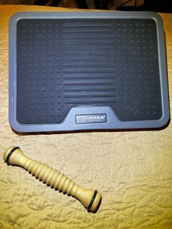 Eureka Ergonomic Adjustable Foot Rest designed to improve posture and comfort while sitting at a desk