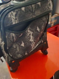 Lori greener suitcase
