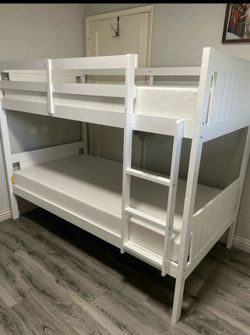 Twin over twin bunk bed. White or espresso. Assembly required. Assembly not included. Taxes included. Free delivery.  Bunk Bed only without Assembly-$