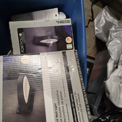 Two Outdoor Portfolio LED Lamps.  