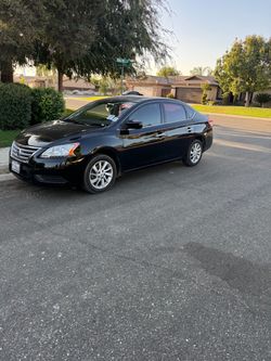 Nissan Sentra Black 4-Door Sedan SV