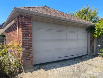 Free Garage Door and tracks.
