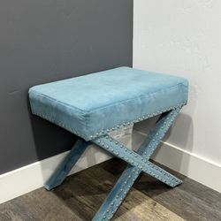 blue ottoman with studs 