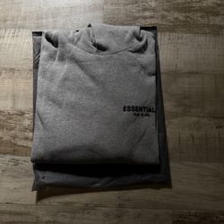 Grey Fear of God Essentials hoodie 
