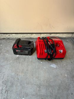 Milwaukee M18 18-Volt 5.0 Ah Lithium-Ion XC Extended Capacity Battery Pack and M12 and M18 charger