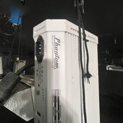 Phantom ballast with hood and light