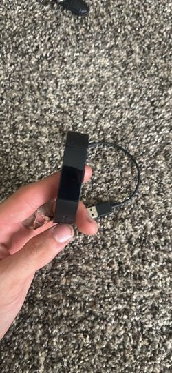 Older Model Fit-Bit with Charger