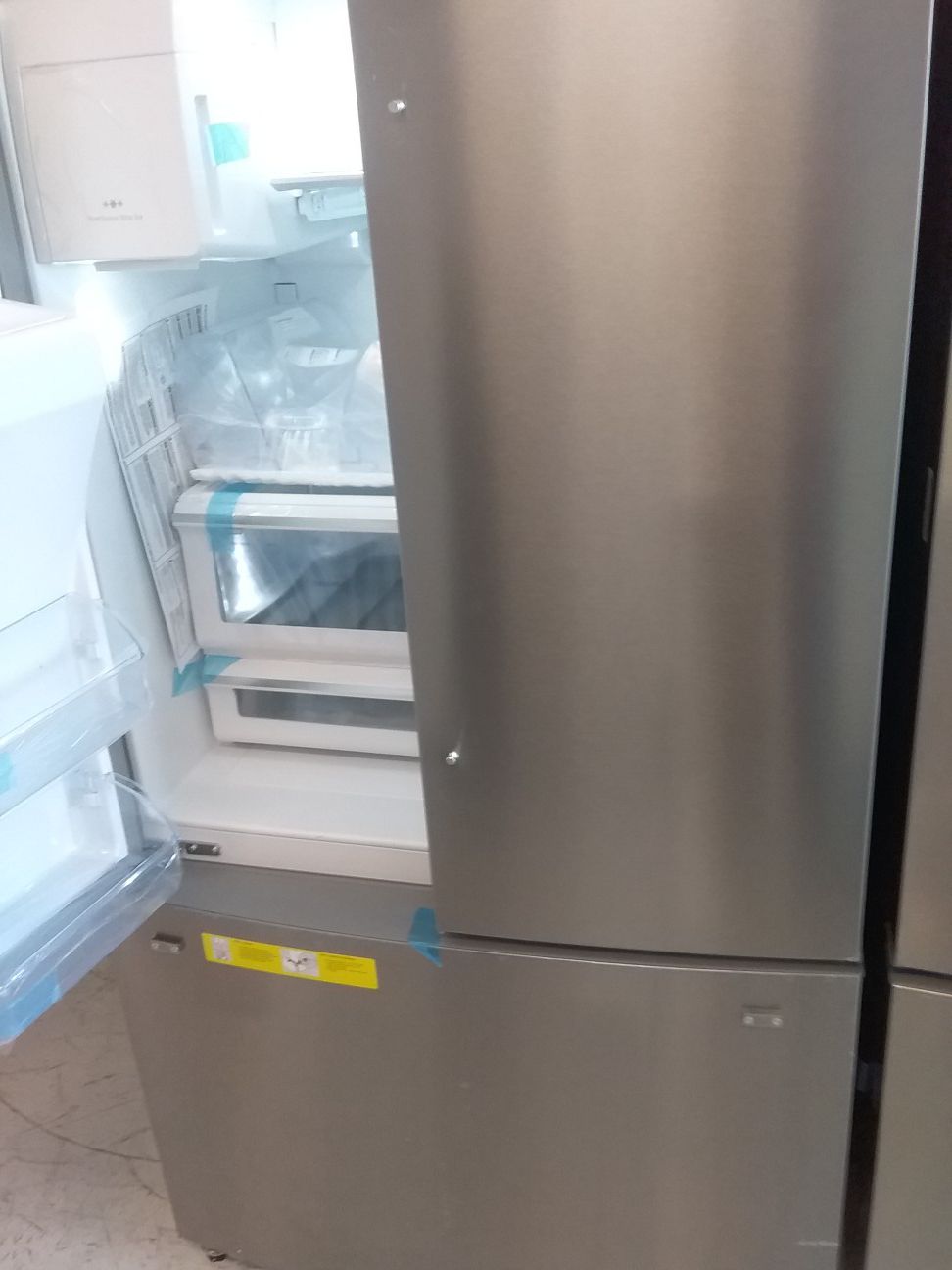 Frigidaire French doors stainless steel refrigerator new open box good condition 6months