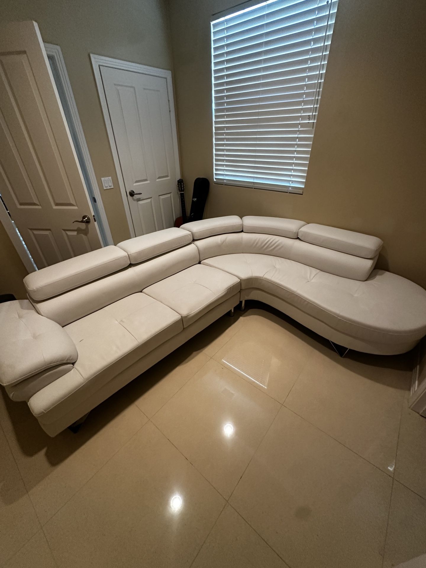 modern white faux leather couch